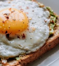 Avocado toast with a fried egg